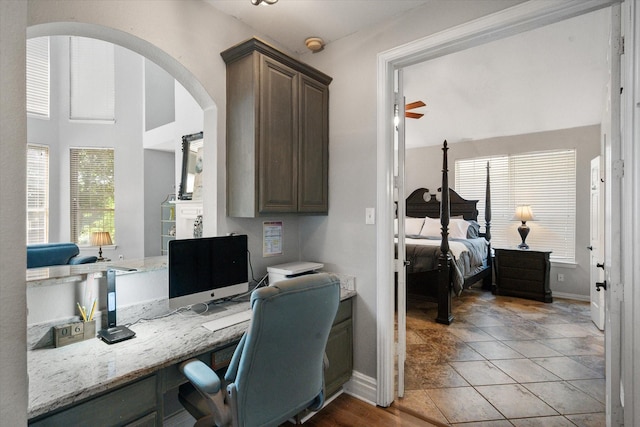 4710 Safe Harbour Dr, Arlington, TX 76016 - office area with a ceiling fan, built in study area, baseboards, and arched walkways