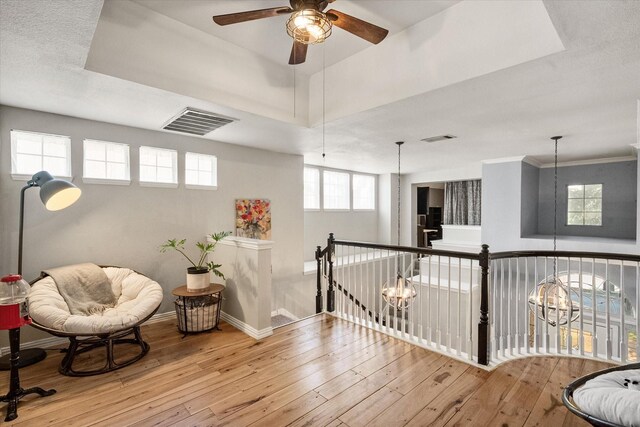 4710 Safe Harbour Dr, Arlington, TX 76016 - sitting room with an upstairs landing, hardwood / wood-style floors, ceiling fan, and baseboards