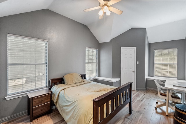 4710 Safe Harbour Dr, Arlington, TX 76016 - bedroom with vaulted ceiling, light wood-style floors, multiple windows, ceiling fan, and baseboards