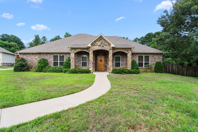12265 Sable Ln, Whitehouse, TX 75791 - french country home featuring roof with shingles, brick siding, and stone siding