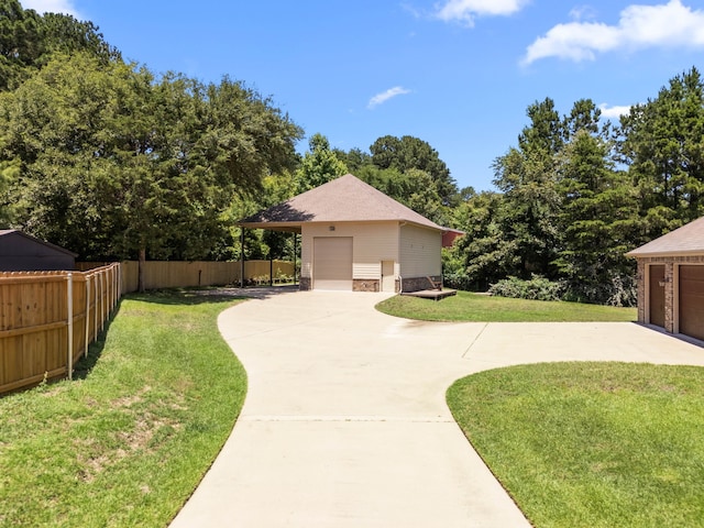 12265 Sable Ln, Whitehouse, TX 75791 - view of yard with an outdoor structure and a garage