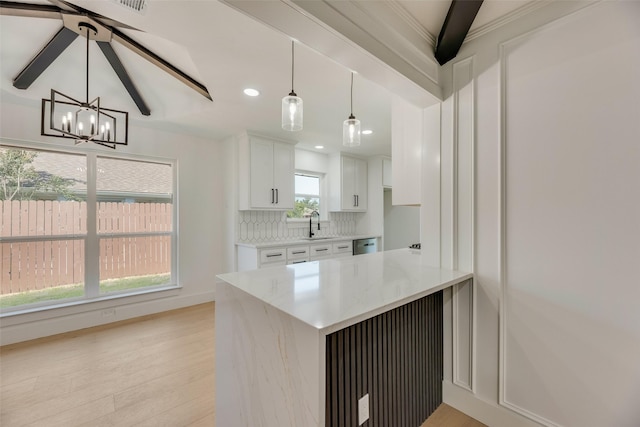 3620 Big Horn Trl, Plano, TX 75075 - kitchen with light wood-type flooring, dishwasher, white cabinetry, tasteful backsplash, and recessed lighting