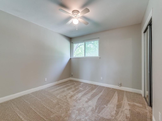 1135 La Mesa Dr, Richardson, TX 75080 - unfurnished bedroom with light colored carpet, baseboards, and a closet