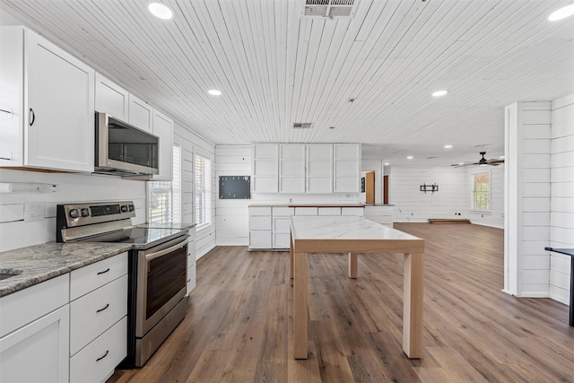 281 Private Road 612, Reagan, TX 76680 - kitchen with appliances with stainless steel finishes, wooden ceiling, plenty of natural light, white cabinets, and recessed lighting