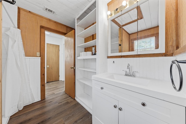281 Private Road 612, Reagan, TX 76680 - full bath with vanity, wood finished floors, wooden walls, and wooden ceiling