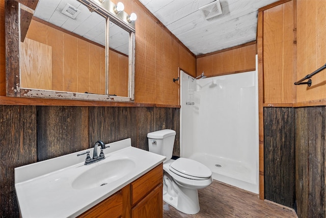 281 Private Road 612, Reagan, TX 76680 - bathroom with a shower, vanity, wood finished floors, and wood walls