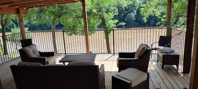 281 Private Road 612, Reagan, TX 76680 - wooden terrace featuring an outdoor hangout area
