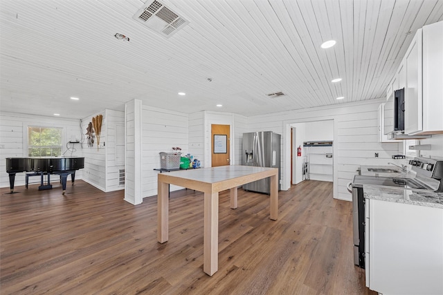 281 Private Road 612, Reagan, TX 76680 - kitchen featuring stainless steel appliances, white cabinets, recessed lighting, wood finished floors, and wood ceiling