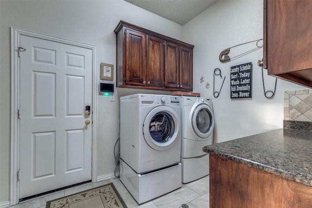 5891 Harmony Ranch Rd, Aubrey, TX 76227 - laundry room with cabinet space, separate washer and dryer, light tile patterned floors, and a textured ceiling