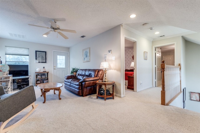 5891 Harmony Ranch Rd, Aubrey, TX 76227 - living area featuring carpet floors, a textured ceiling, ceiling fan, ornamental molding, and recessed lighting