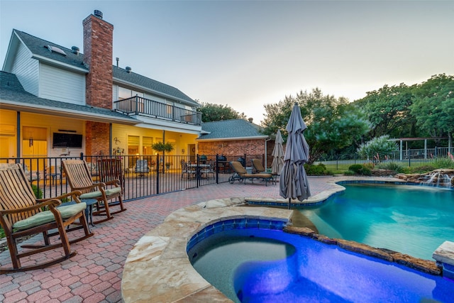 5891 Harmony Ranch Rd, Aubrey, TX 76227 - view of swimming pool featuring a patio area and a pool with connected hot tub