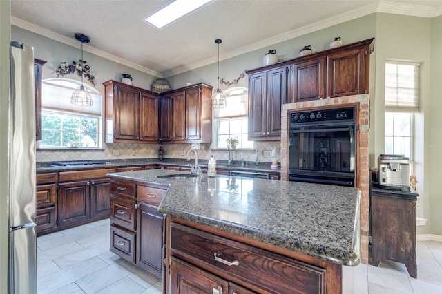 5891 Harmony Ranch Rd, Aubrey, TX 76227 - kitchen with oven, a sink, tasteful backsplash, dishwashing machine, and light tile patterned flooring