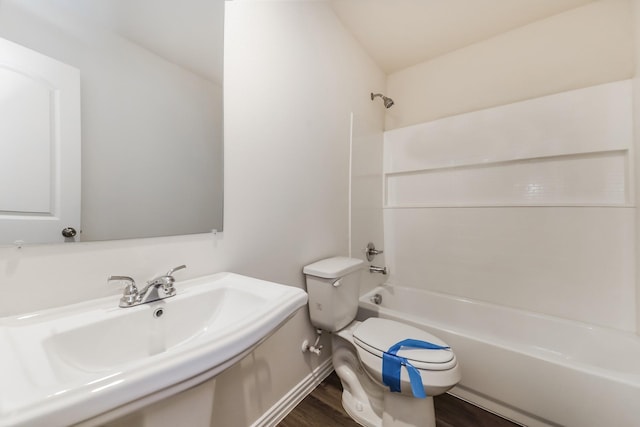 467 Bobbie St, Mabank, TX 75147 - bathroom featuring toilet, wood finished floors, and shower / washtub combination