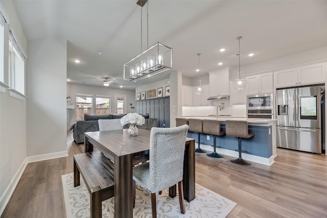 4105 Silver Spur Ct, Aubrey, TX 76227 - dining space with recessed lighting, light wood-style floors, baseboards, and a ceiling fan