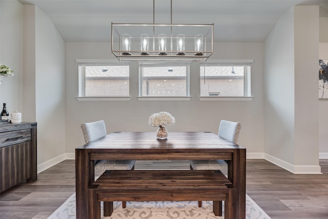 4105 Silver Spur Ct, Aubrey, TX 76227 - dining area with baseboards, wood finished floors, healthy amount of natural light, and lofted ceiling