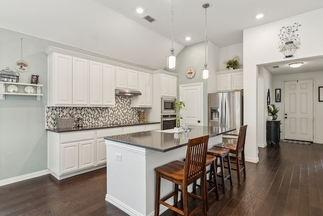 2516 Stella Ln, Northlake, TX 76247 - kitchen with appliances with stainless steel finishes, dark countertops, decorative backsplash, white cabinetry, and recessed lighting