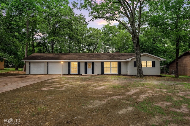 6130 Yarbrough Rd, Shreveport, LA 71119 - view of front of property featuring a garage and driveway