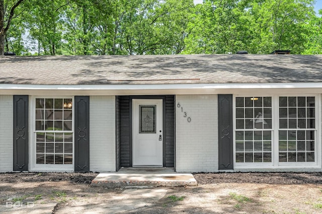 6130 Yarbrough Rd, Shreveport, LA 71119 - entrance to property featuring brick siding and a shingled roof