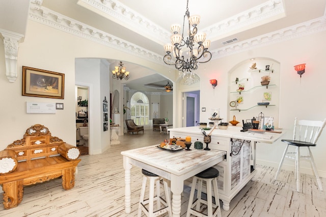 624 Horseshoe Bnd, Royse City, TX 75189 - dining space with arched walkways, a chandelier, baseboards, crown molding, and light wood-type flooring