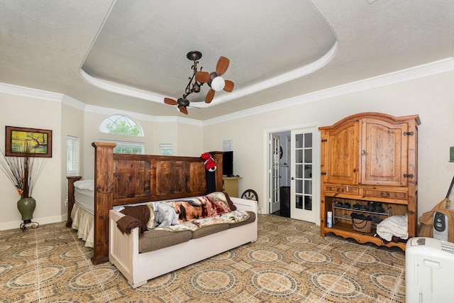 624 Horseshoe Bnd, Royse City, TX 75189 - bedroom featuring a tray ceiling, baseboards, crown molding, ceiling fan, and a chandelier