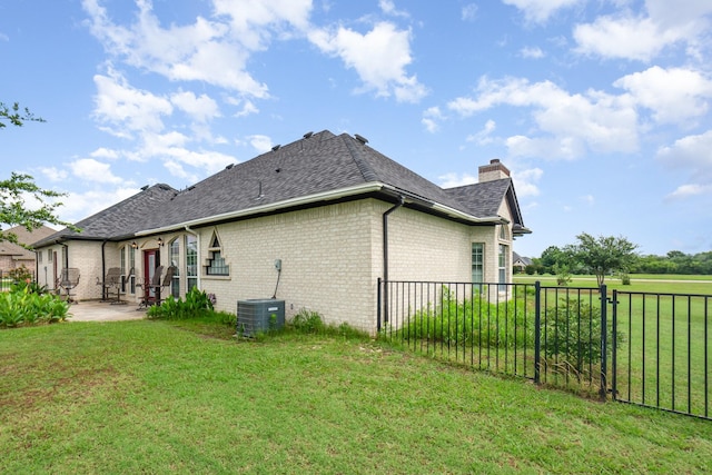 624 Horseshoe Bnd, Royse City, TX 75189 - rear view of property featuring brick siding, a chimney, a shingled roof, and a patio area