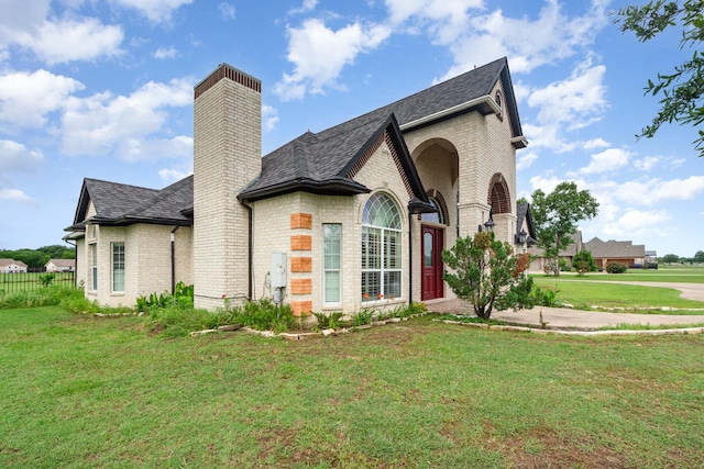 624 Horseshoe Bnd, Royse City, TX 75189 - view of side of home featuring brick siding, a chimney, and roof with shingles