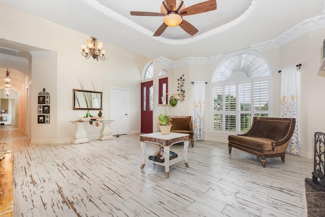 624 Horseshoe Bnd, Royse City, TX 75189 - living area featuring a chandelier, a high ceiling, ceiling fan, and baseboards