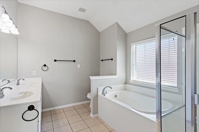 3148 Guadaloupe, Grand Prairie, TX 75054 - full bathroom with a garden tub, double vanity, toilet, baseboards, and tile patterned flooring