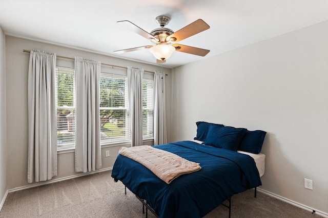 3148 Guadaloupe, Grand Prairie, TX 75054 - bedroom with carpet floors, baseboards, and a ceiling fan