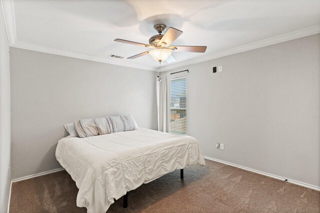 3148 Guadaloupe, Grand Prairie, TX 75054 - carpeted bedroom featuring baseboards, ornamental molding, and a ceiling fan