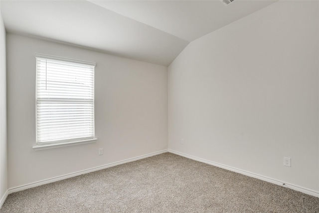 2112 Steer Creek Pl, Mesquite, TX 75149 - carpeted spare room with healthy amount of natural light, vaulted ceiling, and baseboards