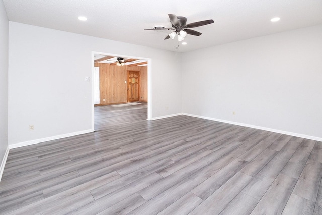 403 W China St, Brady, TX 76825 - empty room with ceiling fan, wood finished floors, baseboards, and recessed lighting