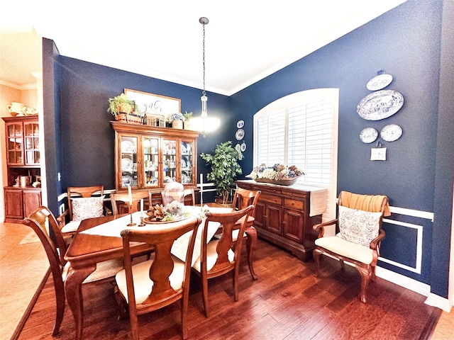 599 N Weldon, Frankston, TX 75763 - dining room with ornamental molding, wood finished floors, and baseboards