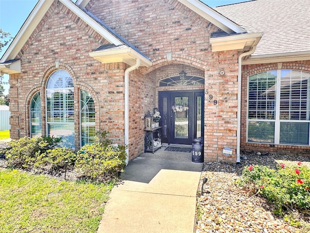 599 N Weldon, Frankston, TX 75763 - entrance to property featuring brick siding and a shingled roof