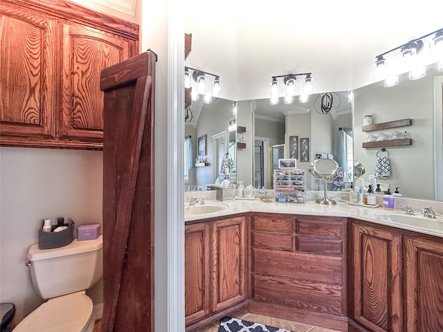 599 N Weldon, Frankston, TX 75763 - full bathroom with double vanity, toilet, and crown molding