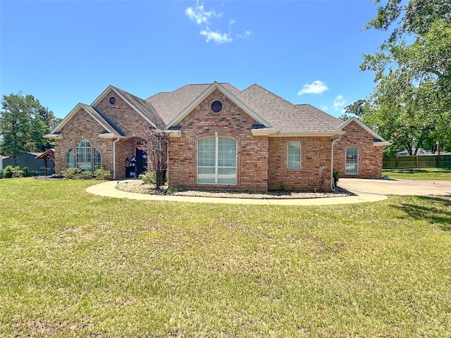 599 N Weldon, Frankston, TX 75763 - view of front of house featuring brick siding and roof with shingles