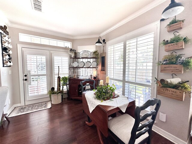 599 N Weldon, Frankston, TX 75763 - dining room with crown molding and dark wood finished floors