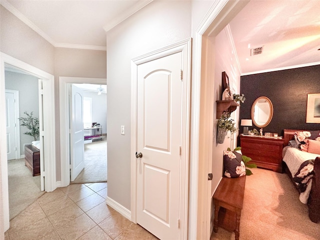 599 N Weldon, Frankston, TX 75763 - hallway featuring light colored carpet, crown molding, light tile patterned flooring, and baseboards