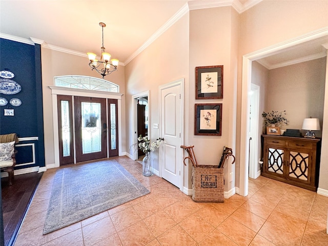 599 N Weldon, Frankston, TX 75763 - foyer entrance featuring a chandelier, crown molding, light tile patterned floors, baseboards, and a high ceiling