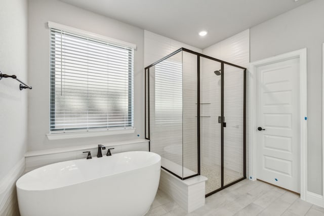 1105 Alaska, Forney, TX 75126 - bathroom with a freestanding bath, a stall shower, and recessed lighting