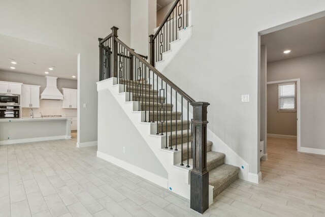1105 Alaska, Forney, TX 75126 - staircase with wood finished floors, recessed lighting, and baseboards