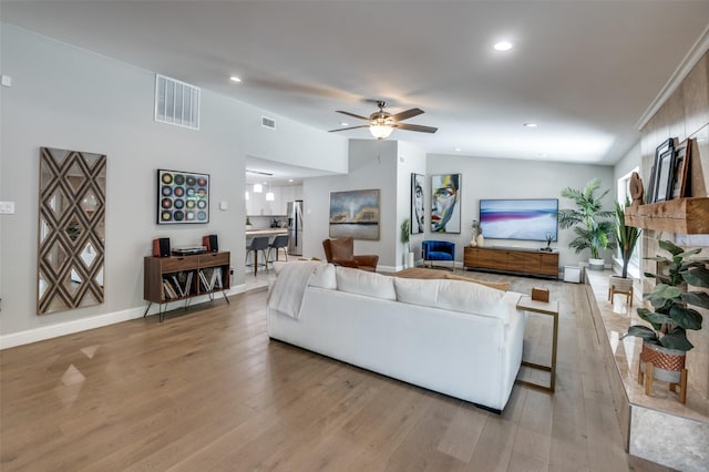 3385 Northaven Rd, Dallas, TX 75229 - living area featuring light wood-style flooring, ceiling fan, recessed lighting, and baseboards