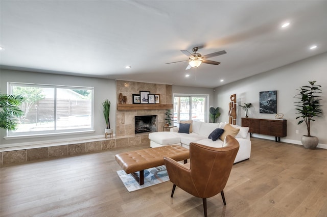 3385 Northaven Rd, Dallas, TX 75229 - living area with plenty of natural light, light wood-type flooring, recessed lighting, and a tile fireplace