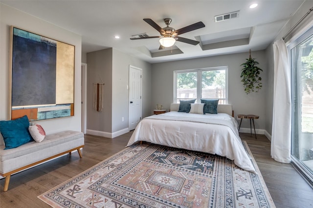 3385 Northaven Rd, Dallas, TX 75229 - bedroom featuring wood finished floors, baseboards, a tray ceiling, recessed lighting, and ceiling fan