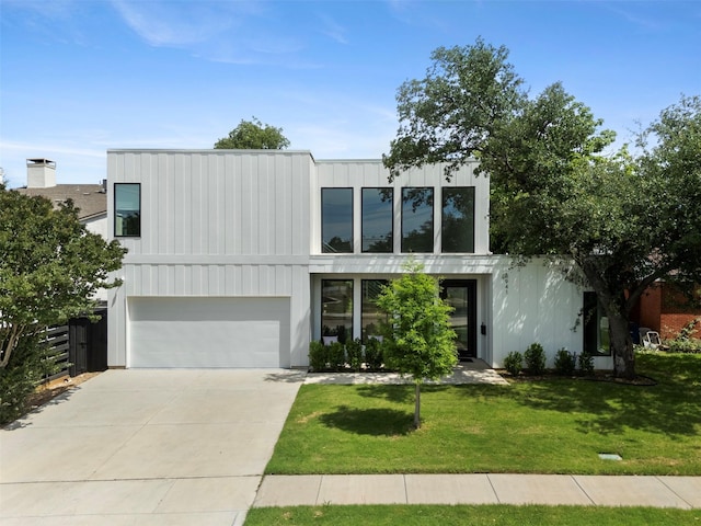 3941 Adrian Dr, Dallas, TX 75209 - contemporary house featuring driveway and an attached garage