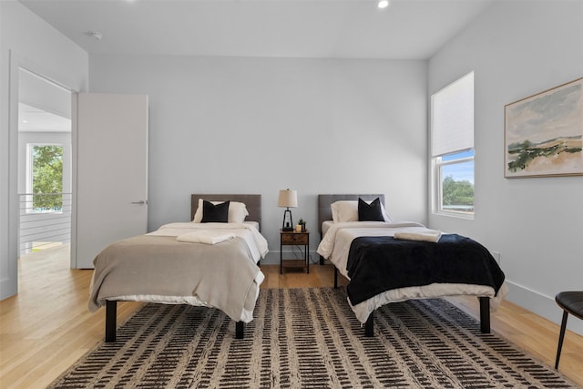3941 Adrian Dr, Dallas, TX 75209 - bedroom with light wood-style flooring and recessed lighting