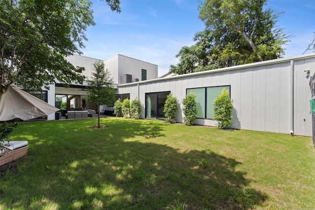 3941 Adrian Dr, Dallas, TX 75209 - view of grassy yard with a jacuzzi