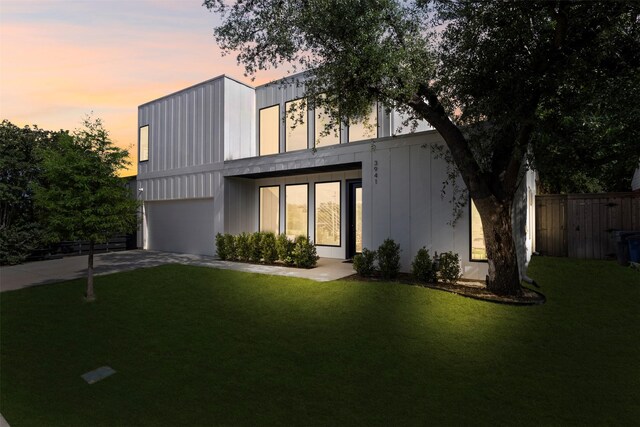 3941 Adrian Dr, Dallas, TX 75209 - contemporary home featuring an attached garage and driveway