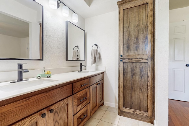 1803 Travis St, Garland, TX 75042 - full bathroom featuring double vanity and tile patterned flooring