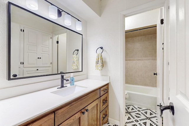 1803 Travis St, Garland, TX 75042 - bathroom featuring vanity, tile patterned floors, and tub / shower combination